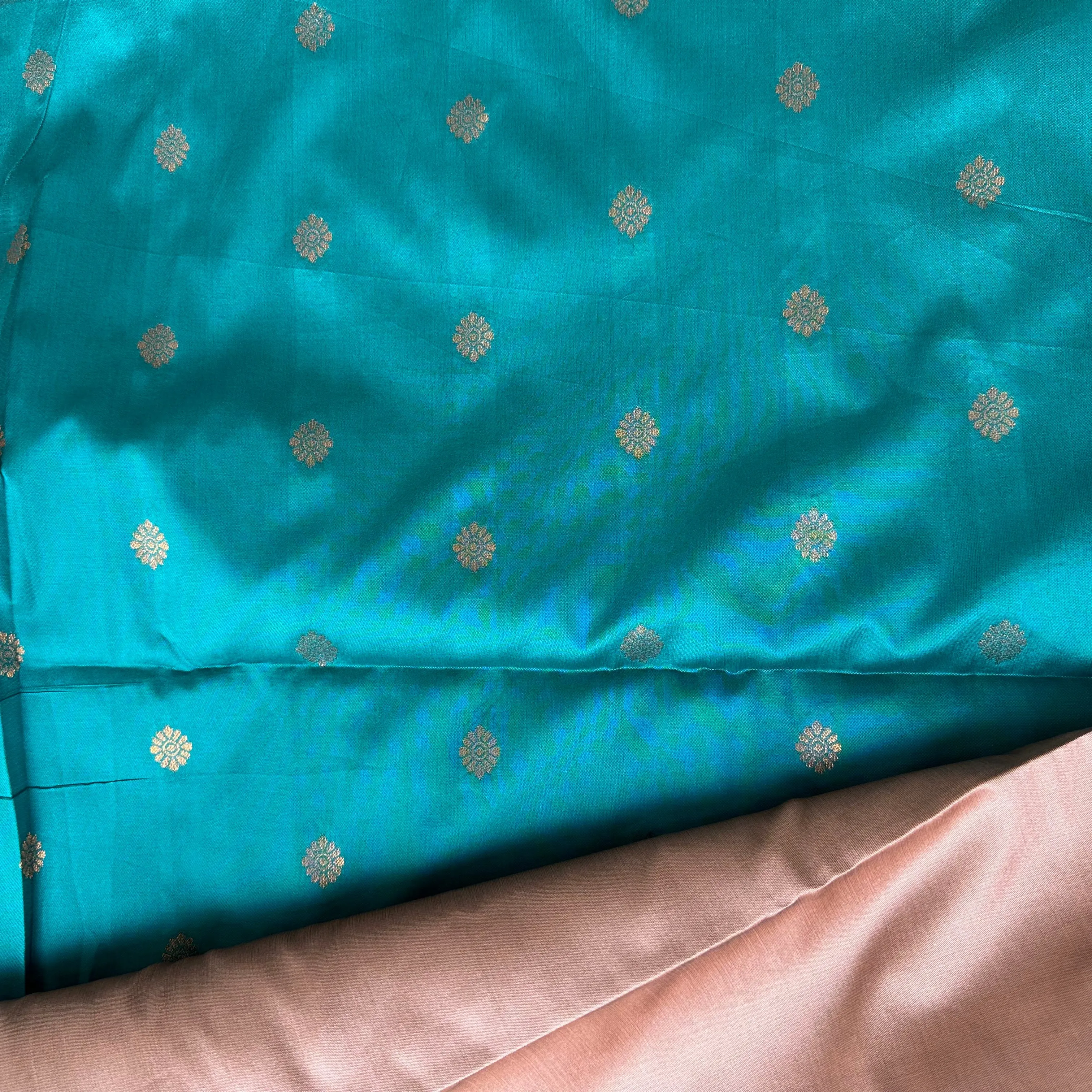 Serenity in Contrast: Plaster Brown Saree with Blue-Green Pallu