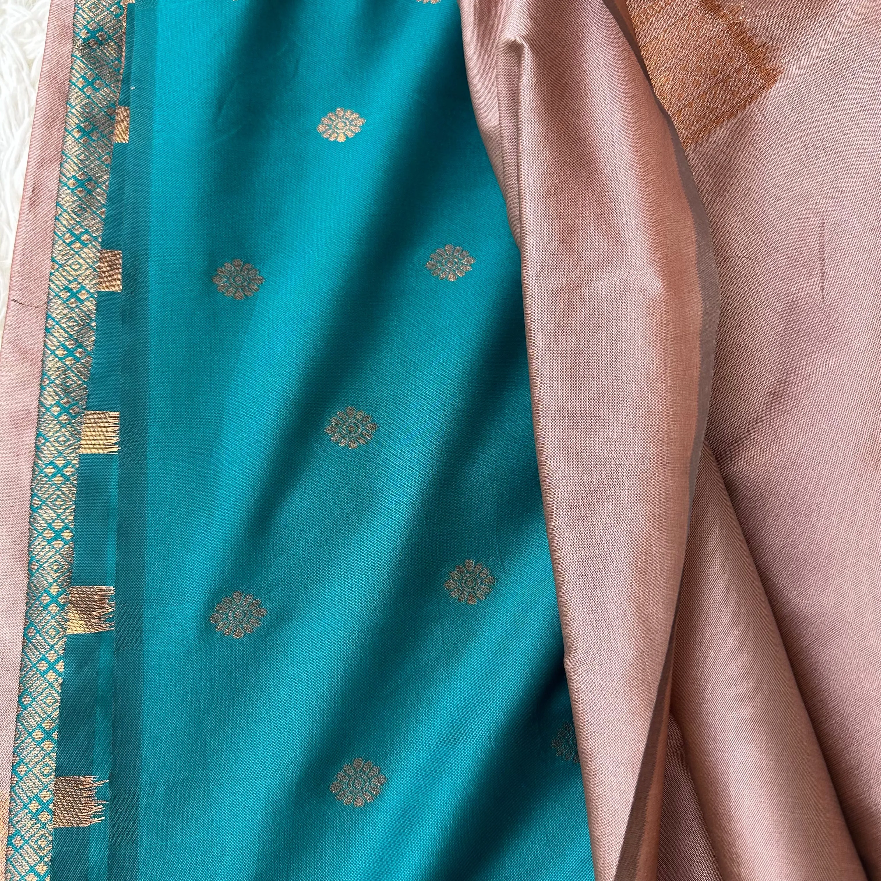 Serenity in Contrast: Plaster Brown Saree with Blue-Green Pallu